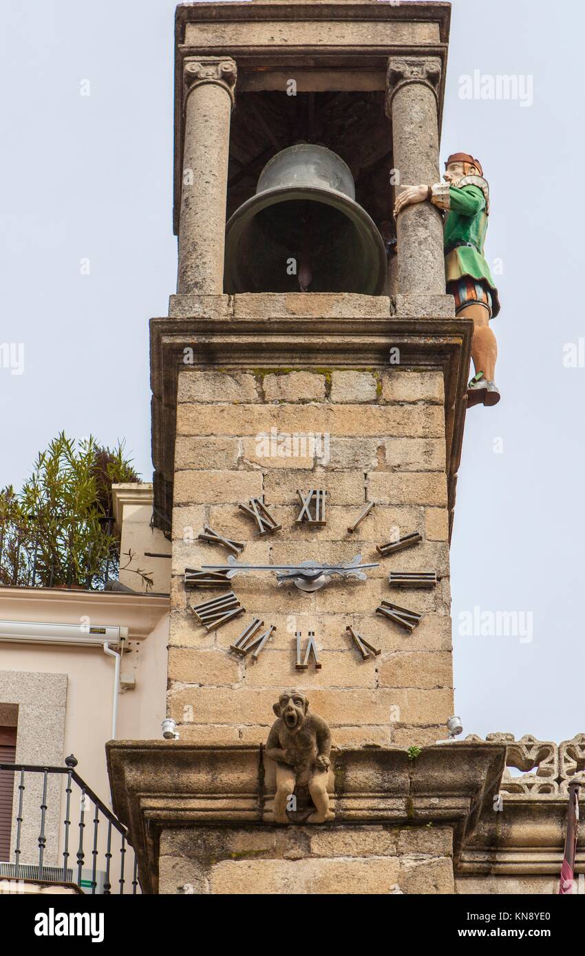 Plasencia City Hall building clock tower with Abuelo Mayorga. The Mayorga Grandfather is a statue that strikes each half hour from tower since 1523, Stock Photo