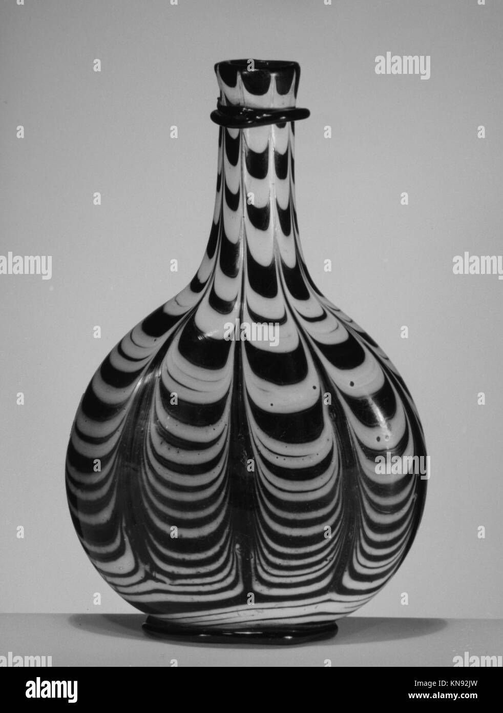Bottle MET 175989 186448 French, Bottle, 18th century, Glass, Height: 8 1/8 in. (20.6 cm). The Metropolitan Museum of Art, New York. Gift of Henry G. Marquand, 1883 (83.7.183) Stock Photo