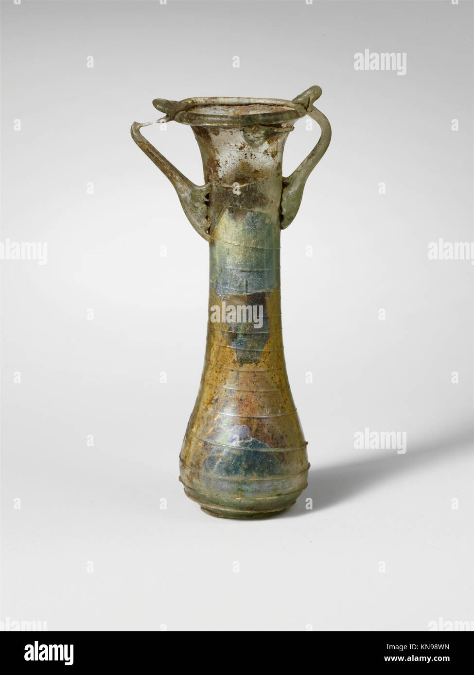 This glass cosmetic flask, or kohl tube, was used in ancient times for ...