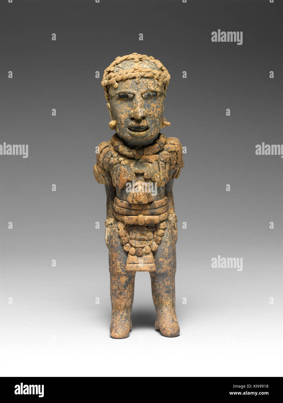 This figure represents a typical example of ancient sculptural art. The ...