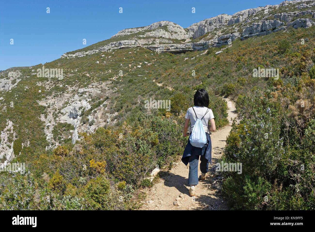 Woman hiking in the SainteBaume Mountains, Provence, France, Europe