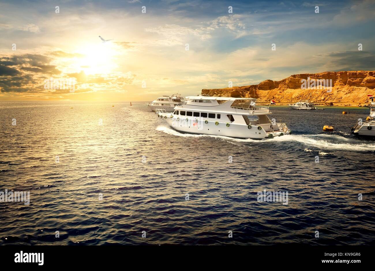White yachts in Red sea at the sunset Stock Photo - Alamy