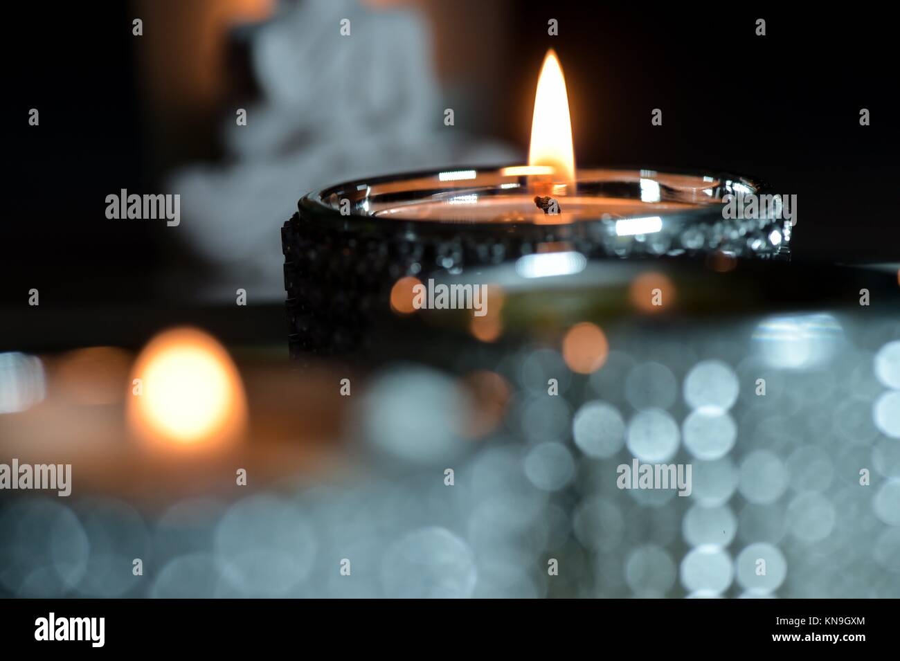 Burning candles Green and red candles studio shoot Stock Photo Alamy