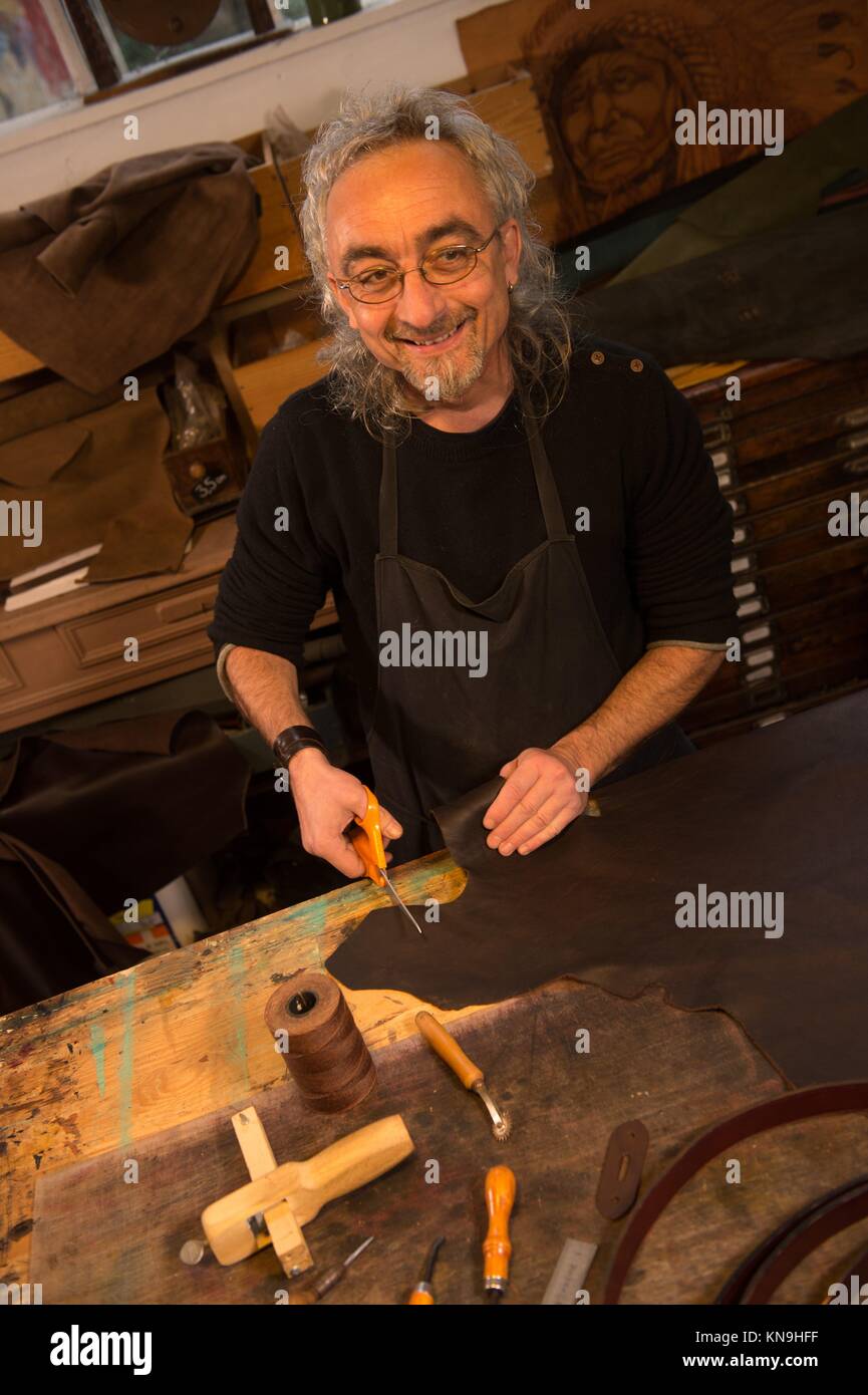 leather goods craftsman at work in his France Stock Photo Alamy