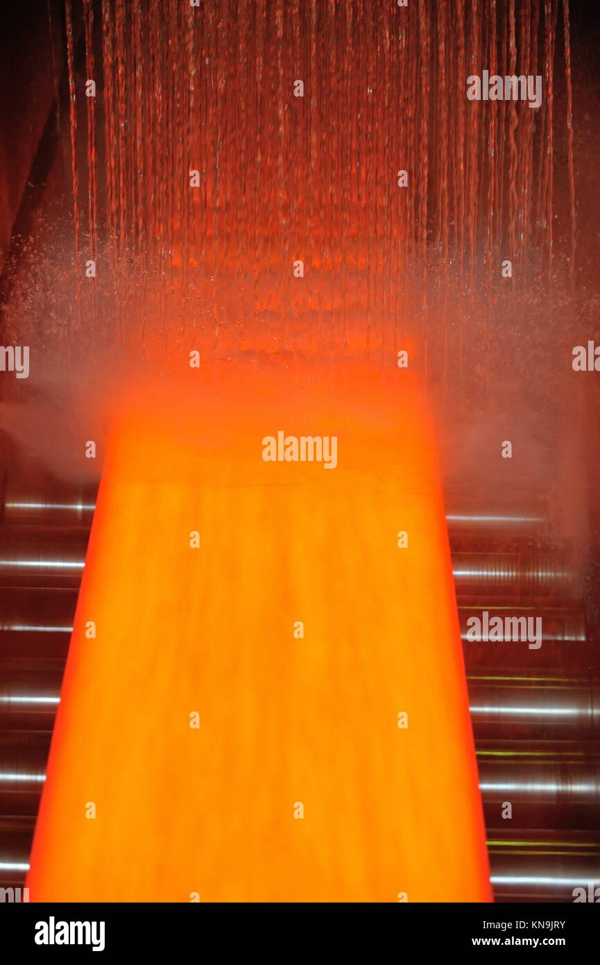 Cooling hot steel plate on conveyor Stock Photo Alamy