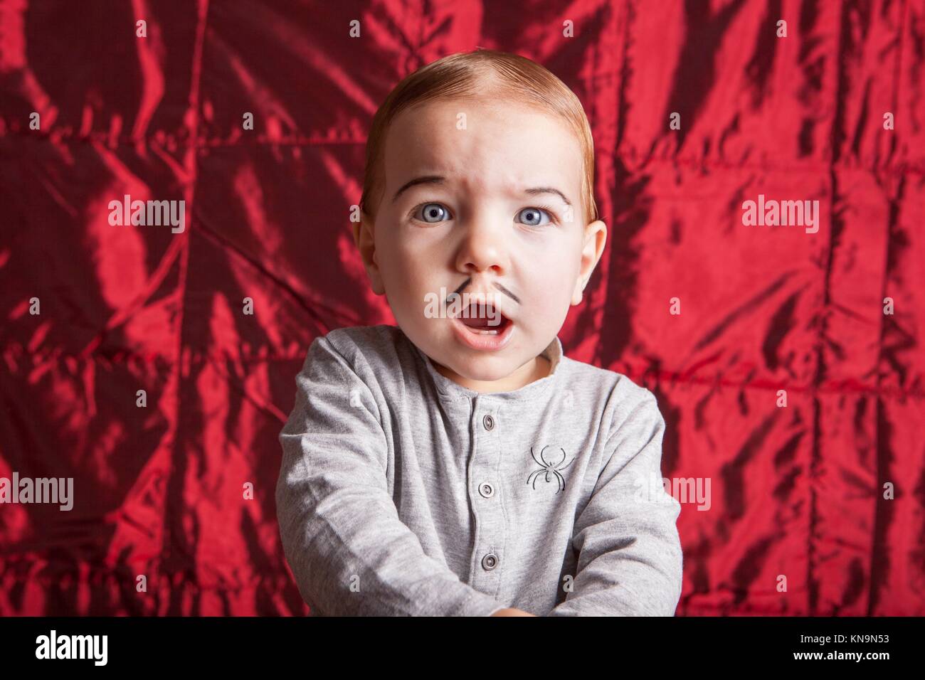 Portrait of a little boy dress up for halloween party. He has a surprised expression. Stock Photo
