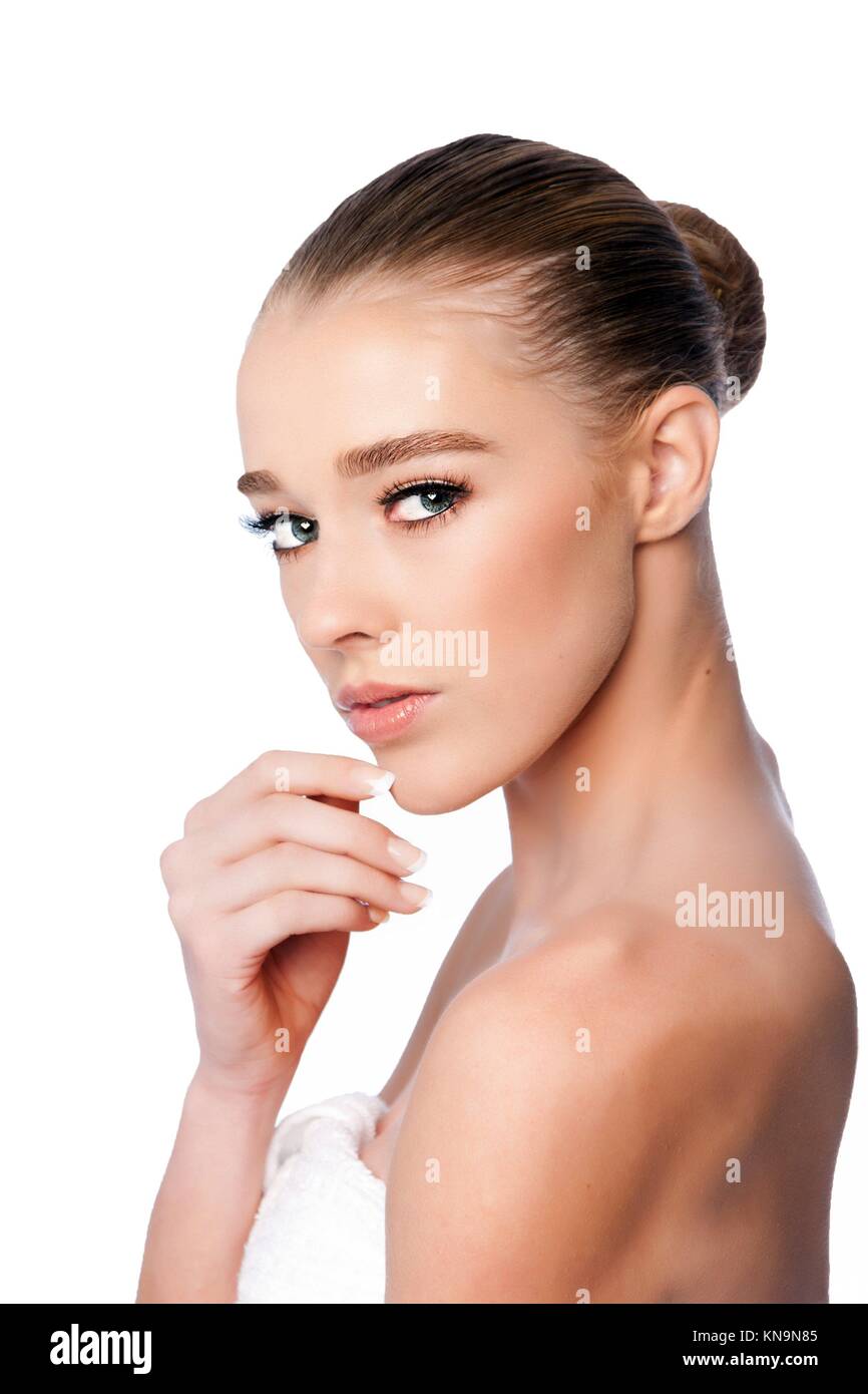 Beautiful clean face of woman from side, aesthetics exfoliating skincare concept, on white. Stock Photo