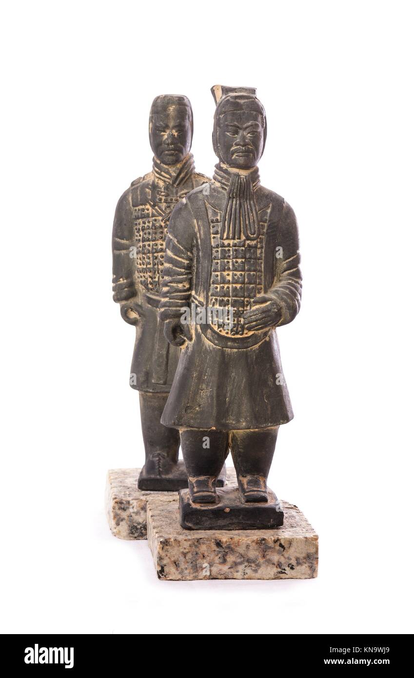 Replicas of two terracotta soldiers over white background. Stock Photo