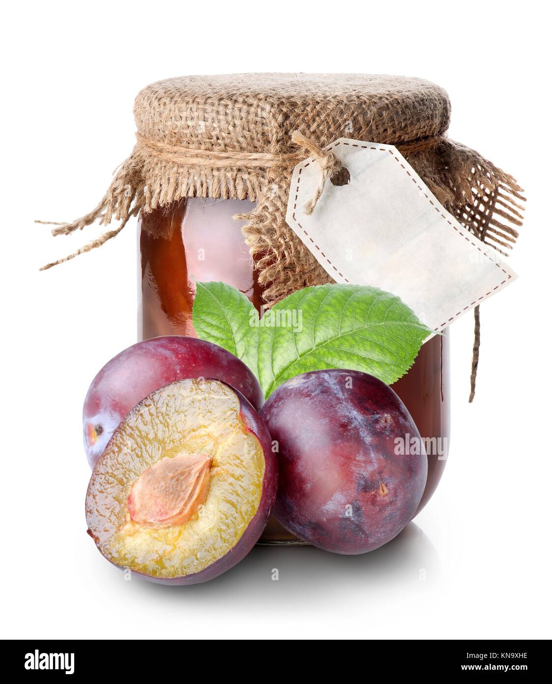 Plums and confiture in a jar isolated on white Stock Photo Alamy