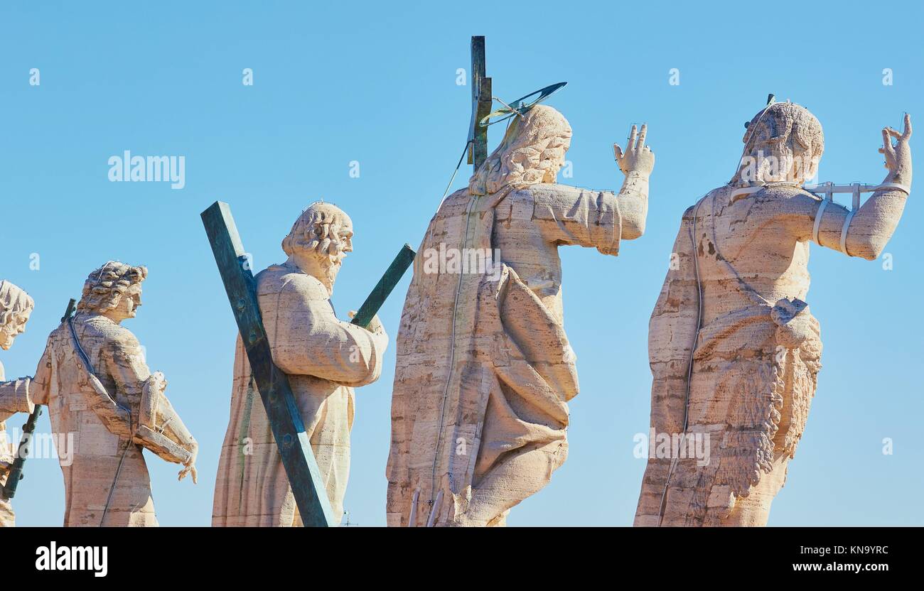 Statues of Jesus and the Apostles lining rooftop facade of St Peter's