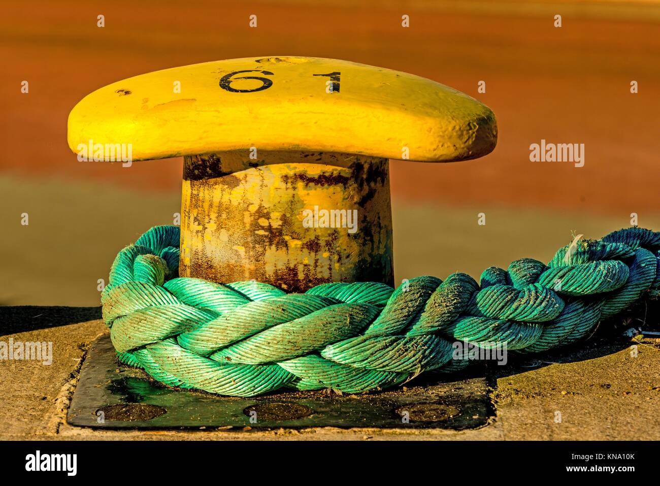 bollard with mooring line Stock Photo Alamy
