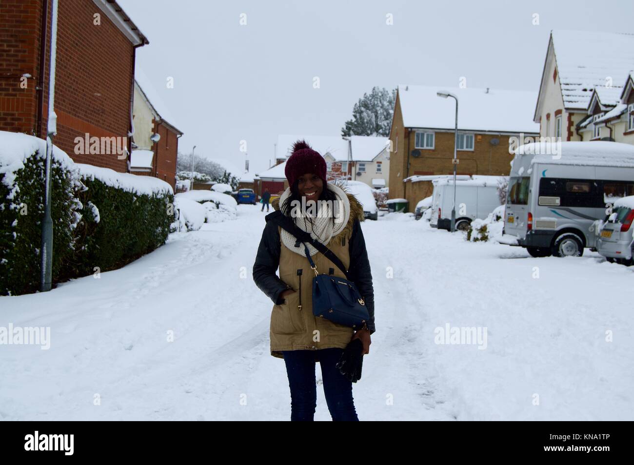 Freezing black woman hires stock photography and images Alamy