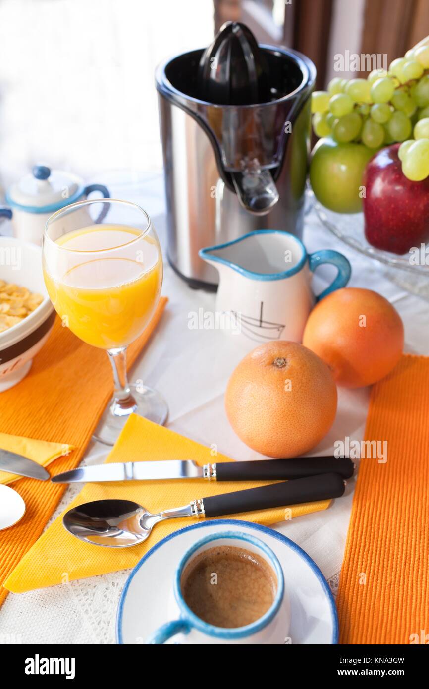 Mediterranean breakfast with coffee, grapefruit juice, fruits Stock