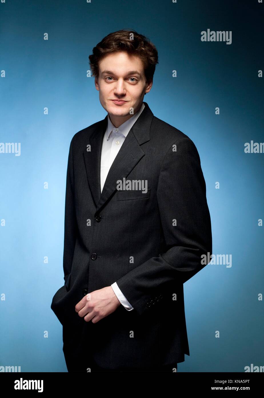 Blue suit man hi-res stock photography and images - Alamy
