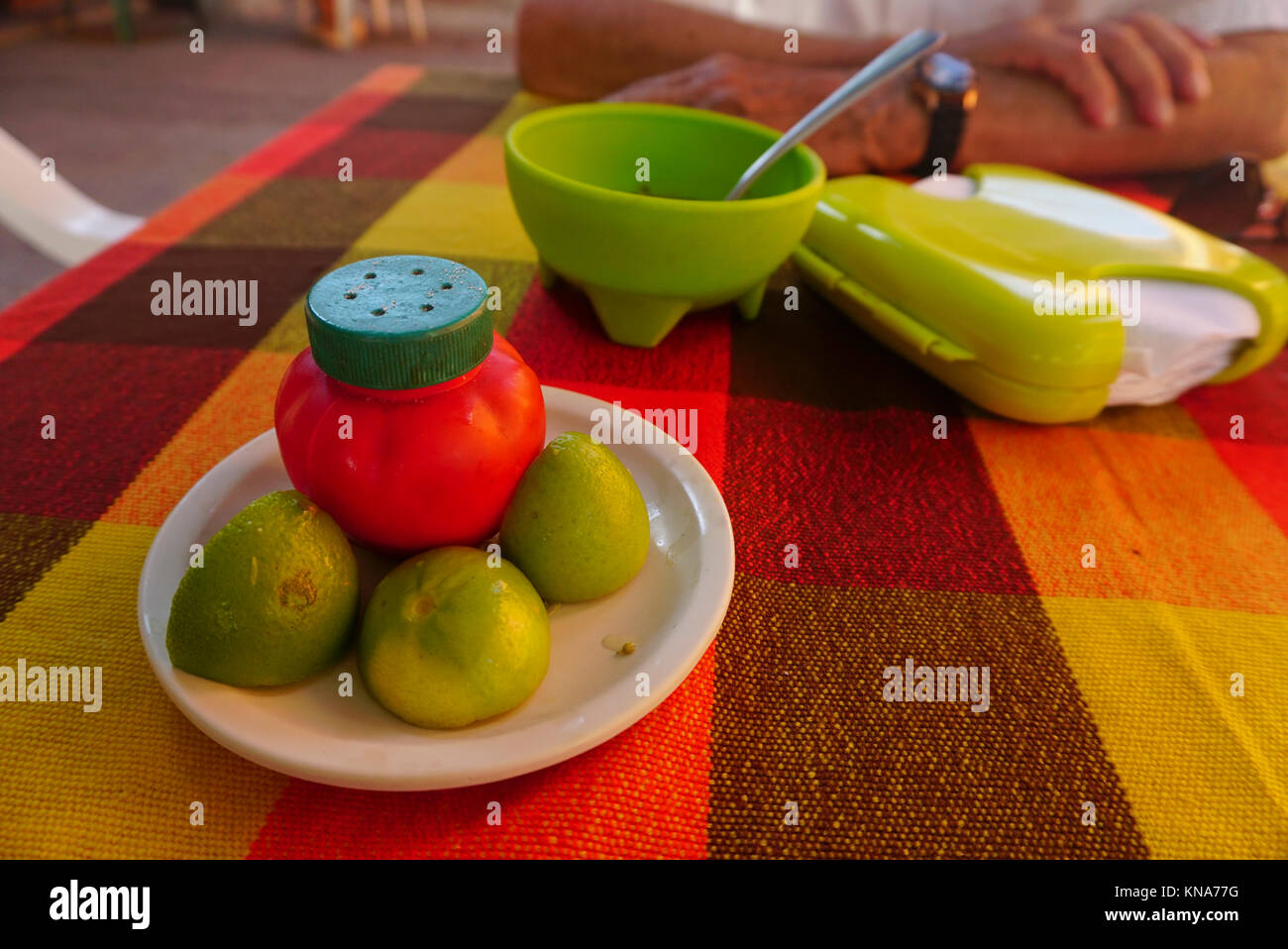 Limes and salt in Mexican restaurant, Acapulco, Mexico Stock Photo