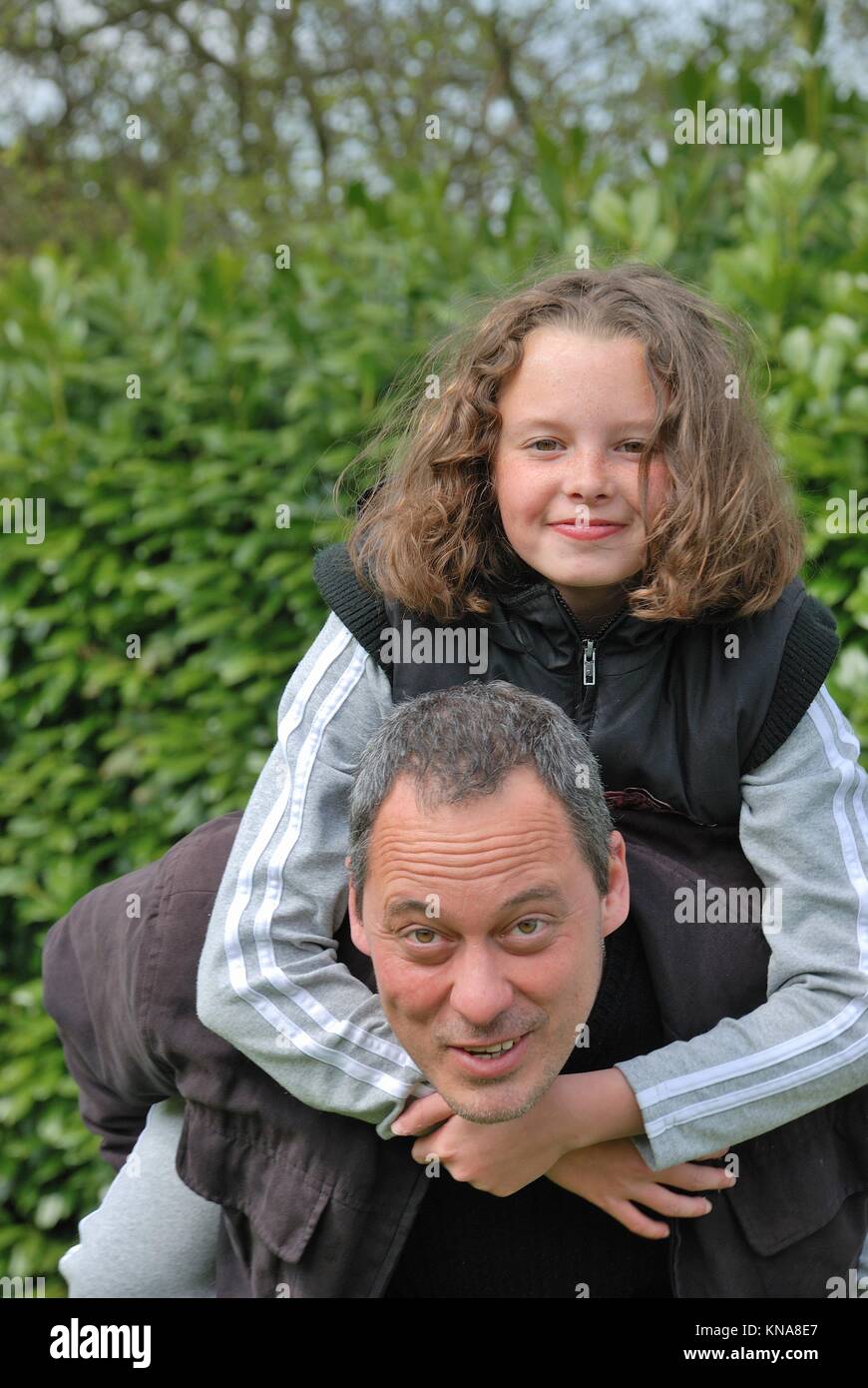 Complicity between father and daughter. Stock Photo