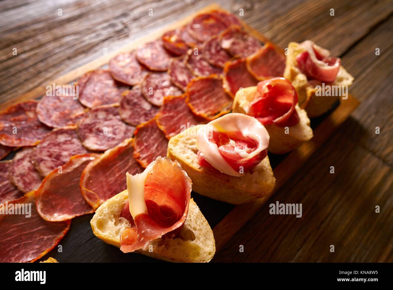 Iberian sausages and ham board Tapas from spain Stock Photo Alamy