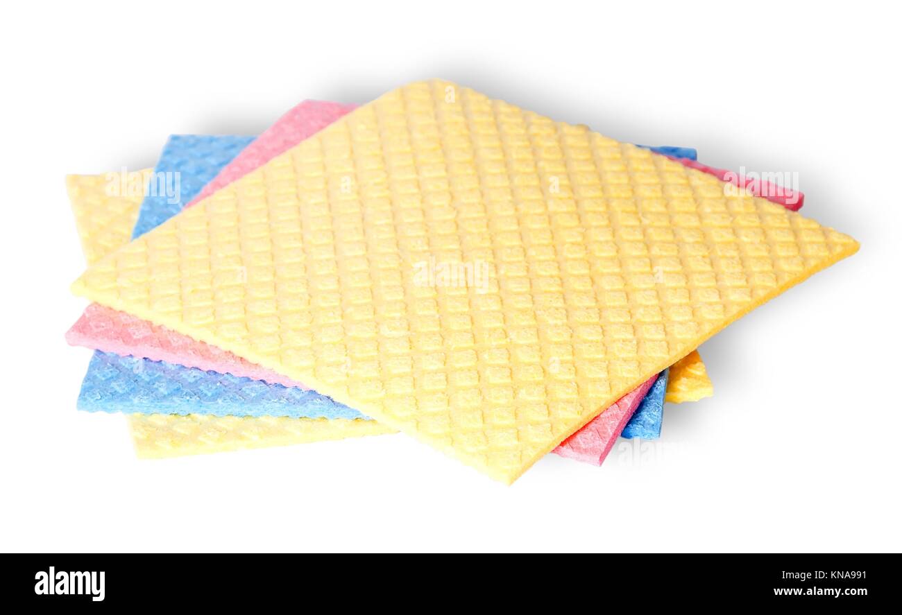 Are scattered colorful sponges for dishwashing isolated on white