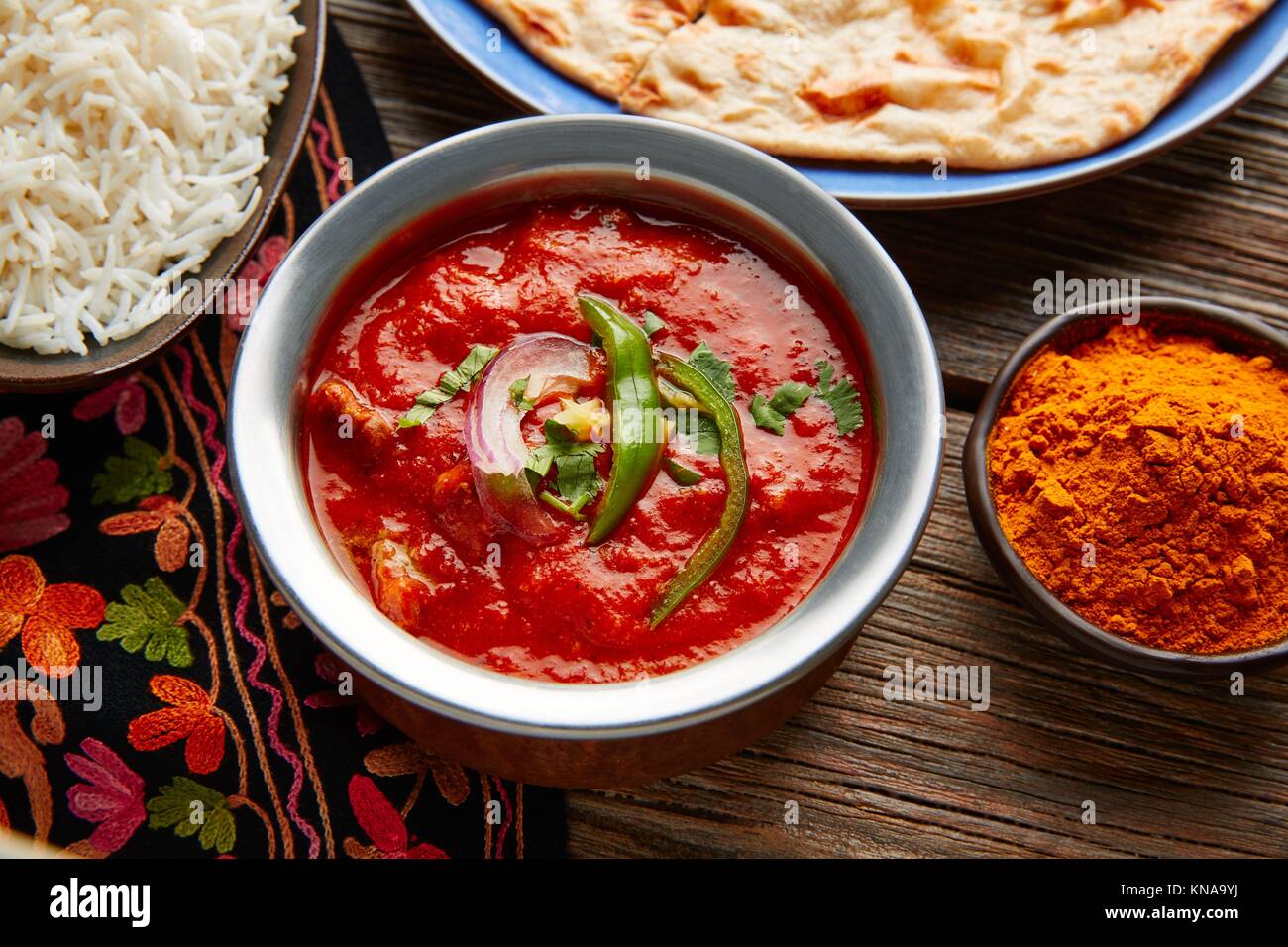 Chicken Tikka Masala indian recipe food on wooden table Stock Photo Alamy