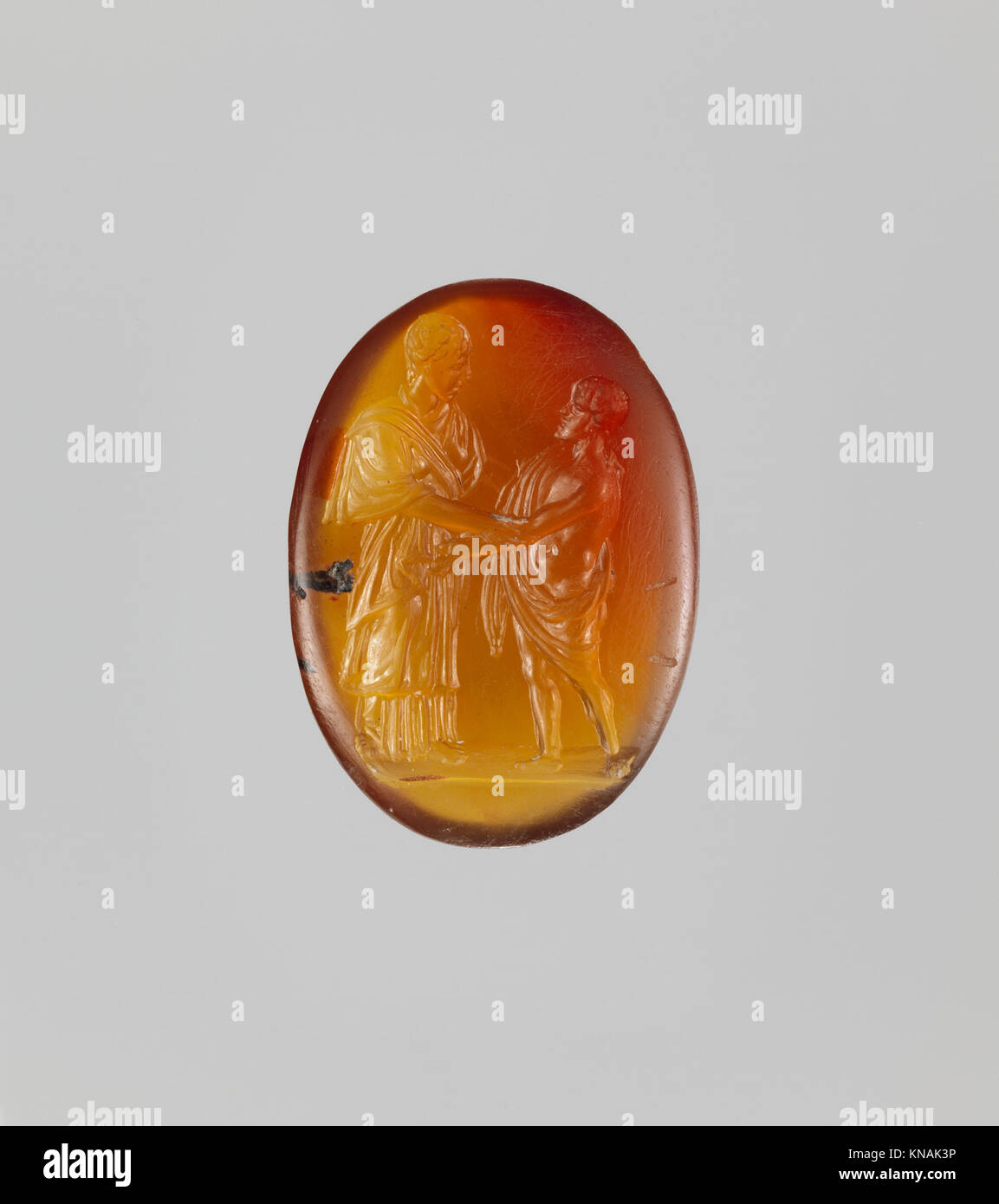 This carnelian ring stone, engraved and used as a seal or amulet ...
