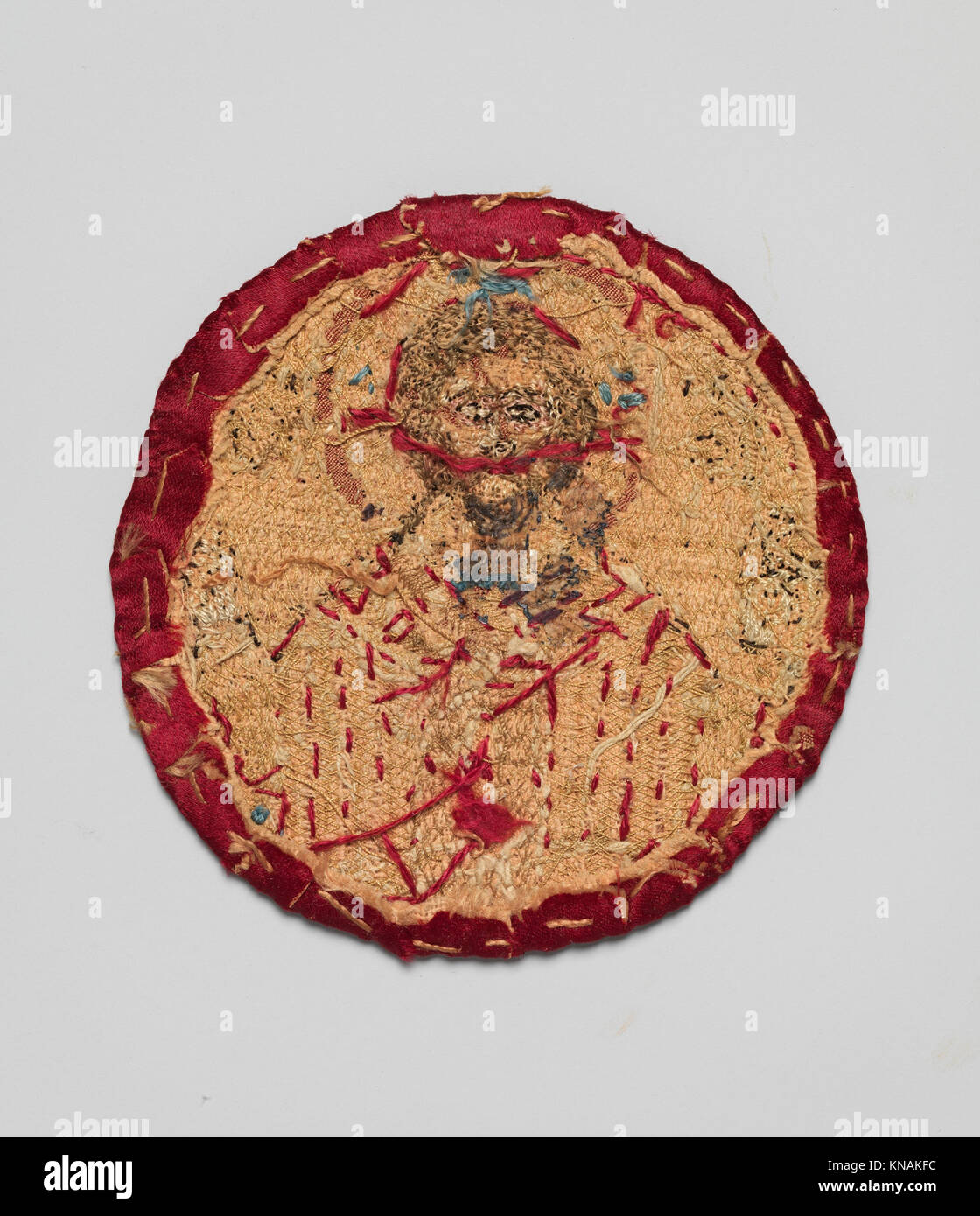 Appliqué from a Vestment MET DP291989 466120 Greek, Appliqu? from a Vestment, 17th?18th century, Silk, with silk and silver wrapped silk threads, Diameter: 4 in. (10.2 cm) Storage: 9 ? 9 ? 1 in. (22.9 ? 22.9 ? 2.5 cm). The Metropolitan Museum of Art, New York. Gift of Jeanne and Lloyd Raport, 1984 (1984.506) Stock Photo