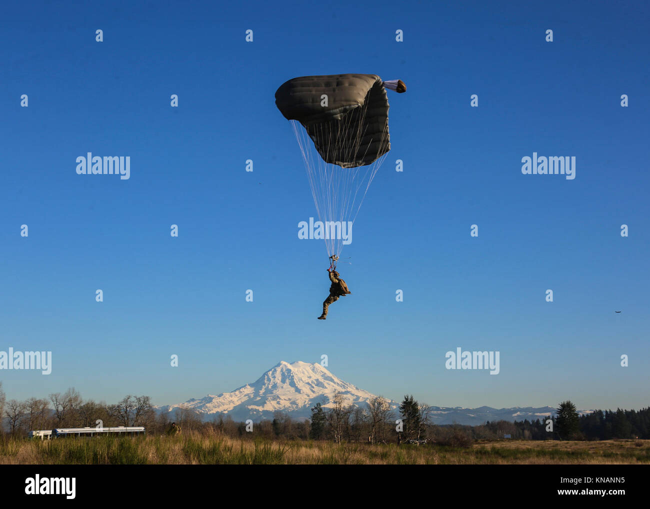 A Paratrooper assigned to 1st Special Forces Group (Airborne) prepares ...