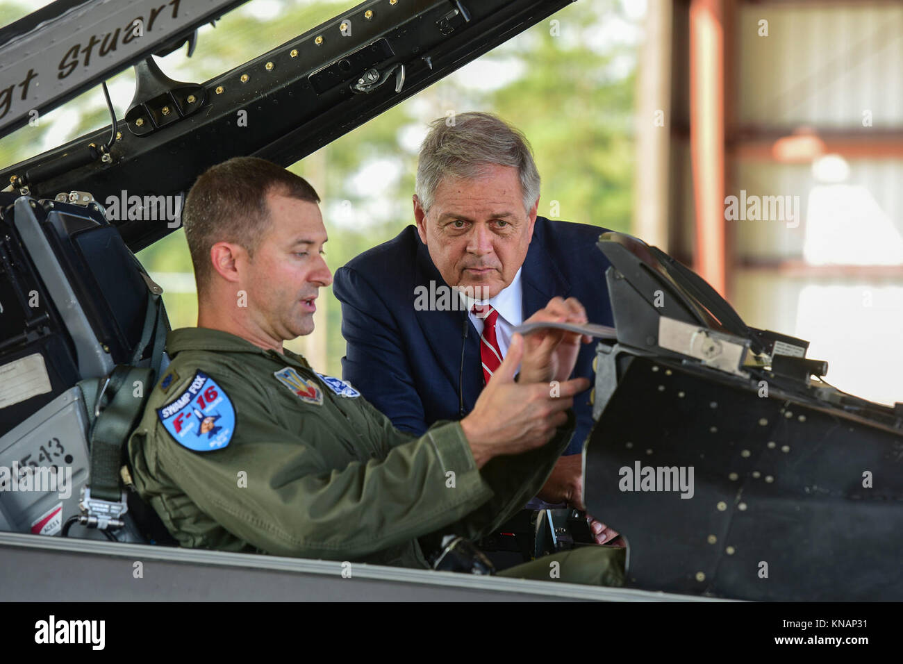 U.S. Air Force Lt. Col. Jeff Beckham, a fighter pilot assigned to the 157th Fighter Squadron, shows U.S. Congressman Ralph Norman, the District 5 representative for the state of South Carolina, the cockpit of an F--16 Fighting Falcon fighter jet during a visit to the South Carolina Air National Guard’s 169th Fighter Wing at McEntire Joint National Guard Base, S.C., Sept. 20, 2017. Norman toured facilities on the base and spoke with leadership about the capabilities of the SCANG. (U.S. Air National Guard Stock Photo