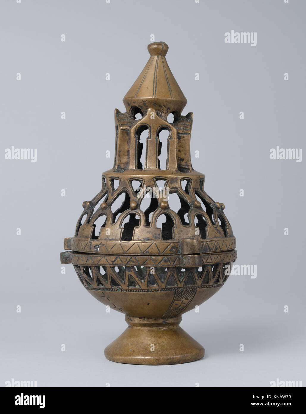 This finely crafted metal censer is used in religious or ceremonial ...