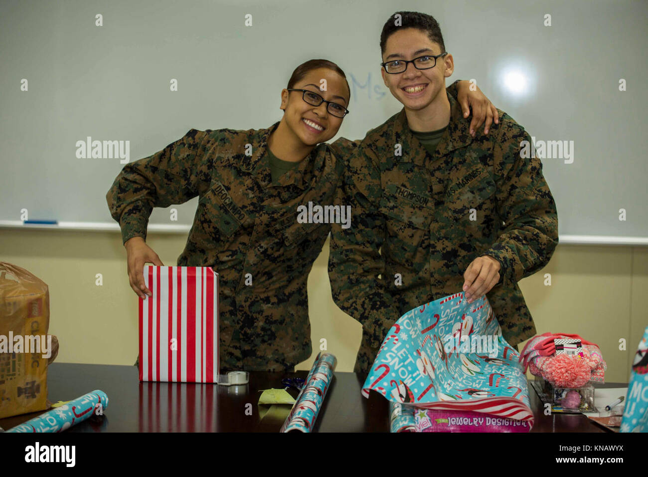 U.S. Marine Corps Lance Cpl. Cyndell Deocampo, left, an aviation supply
