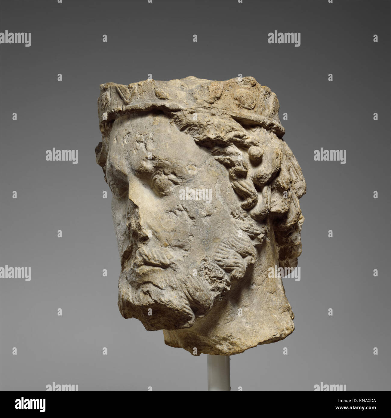 The sculpture 'Head of a King' represents a royal figure, exemplifying ...