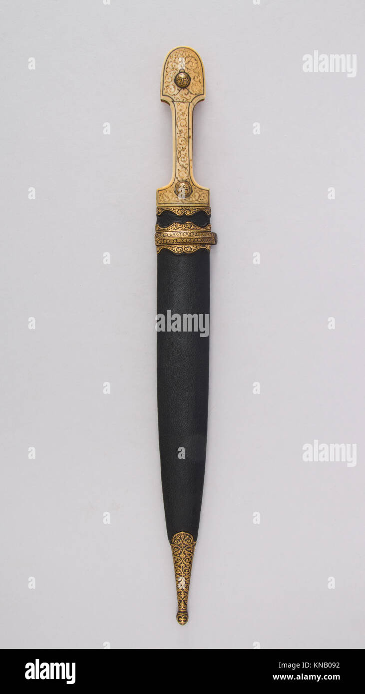 This dagger with sheath demonstrates intricate craftsmanship and design ...