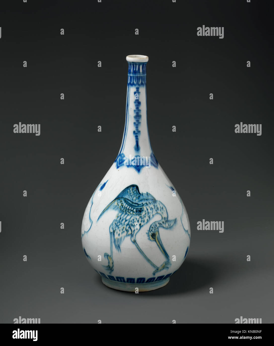 Download Bottle Depicting Storks In Blue And Yellow On A White Background Met Stock Photo Alamy Yellowimages Mockups