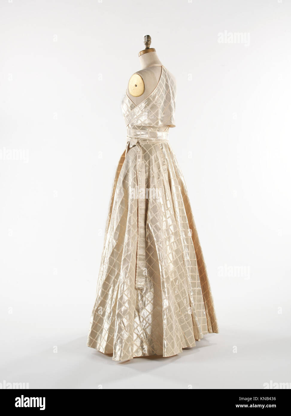 This evening dress, designed by Jeanne Lanvin in 1938-39, exemplifies  French fashion with silk and metal construction, highlighting the style,  elegance, and craftsmanship of the period Stock Photo - Alamy