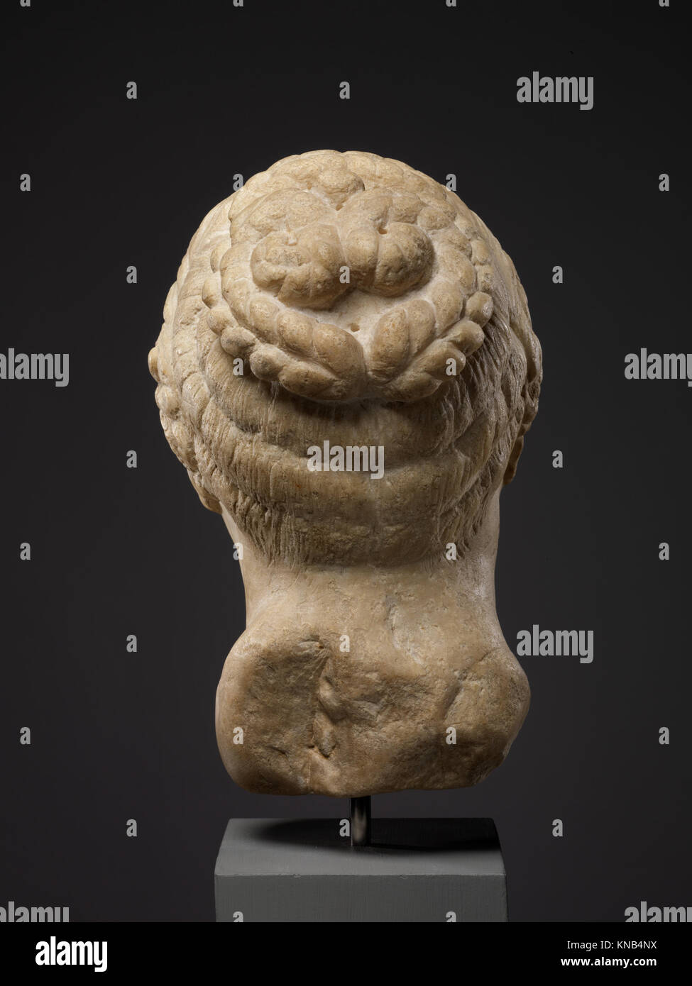Human Head Ritual This head sculpture of a woman illustrates cultural or religious ...