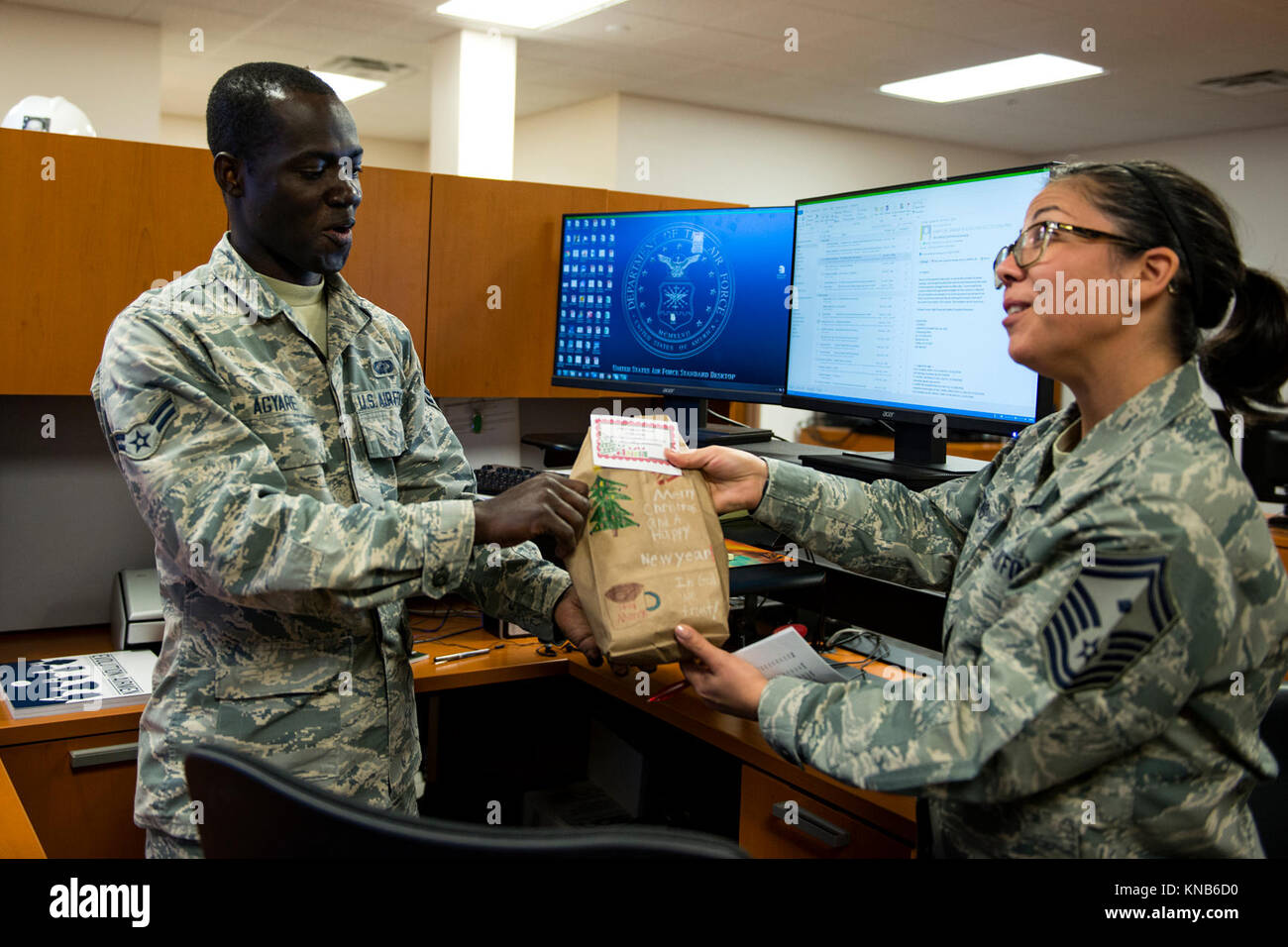 Senior Master Sgt. Regina Dockens, right, 23d Communications Squadron