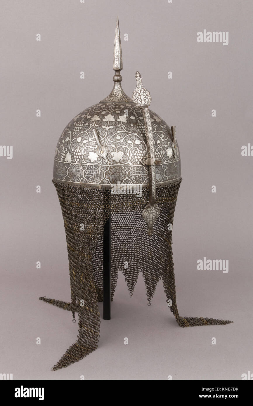 This MET armor set, with helmet, arm guard, and shield, reflects ...