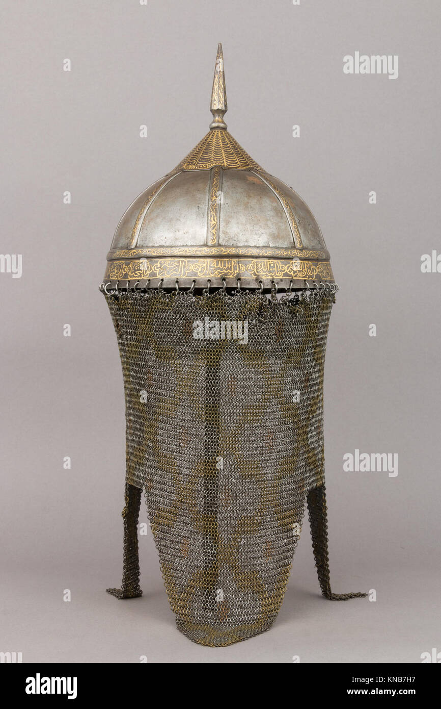 This helmet, an example of ancient armor, features a distinct design ...