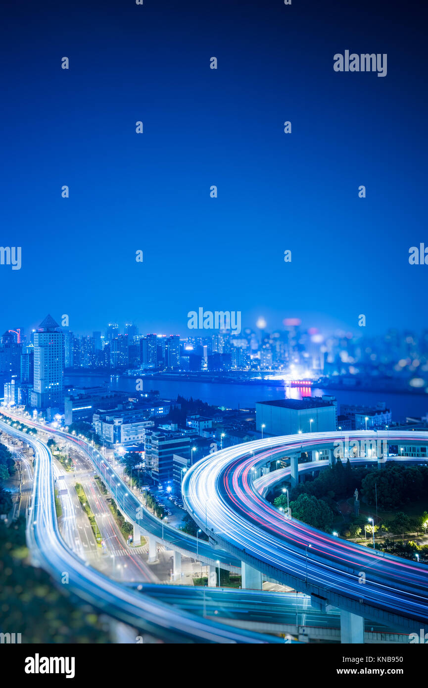 Busy highway traffic light trails at night in city of China Stock Photo ...