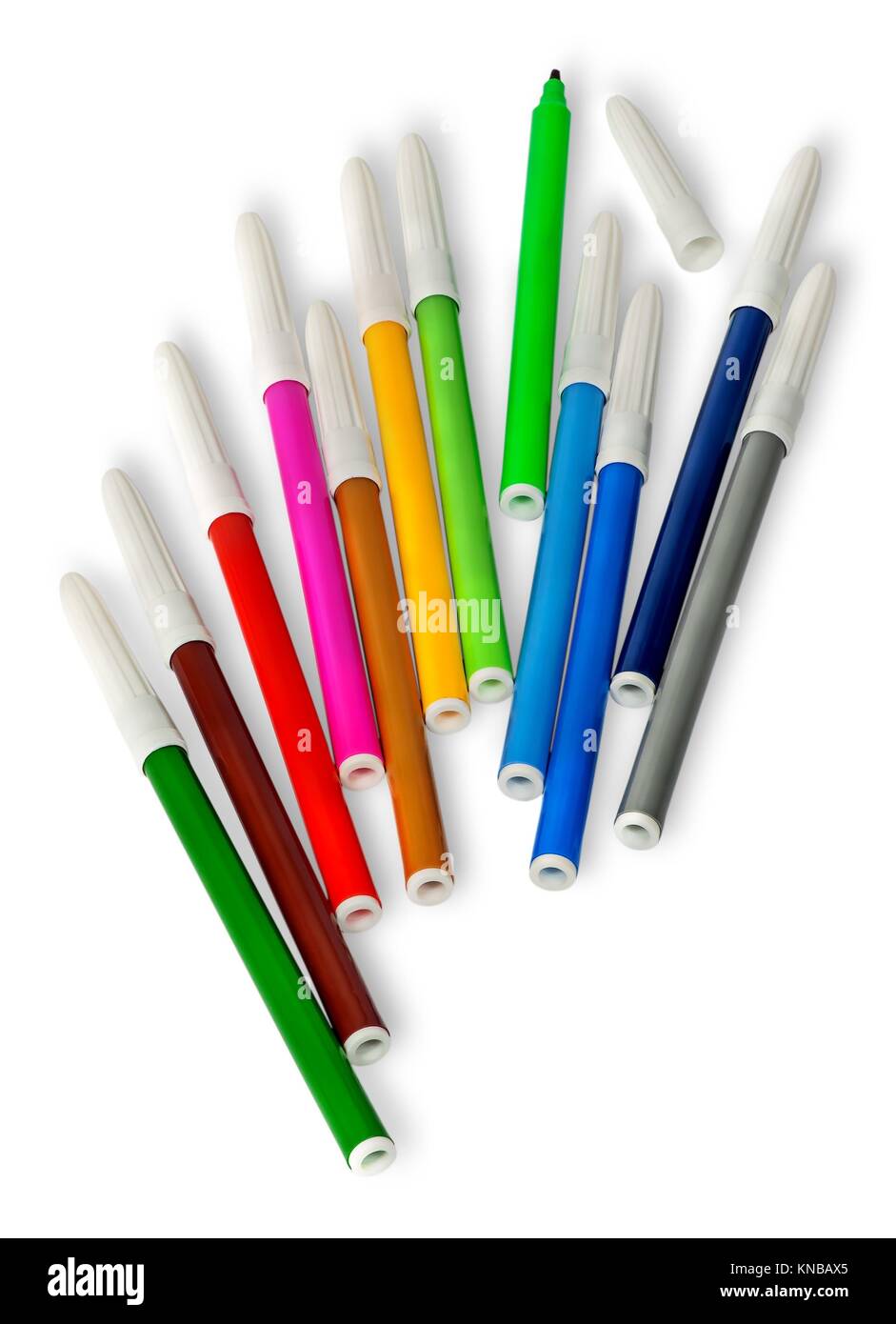 Scattered colored felt tip pens isolated on white background Stock