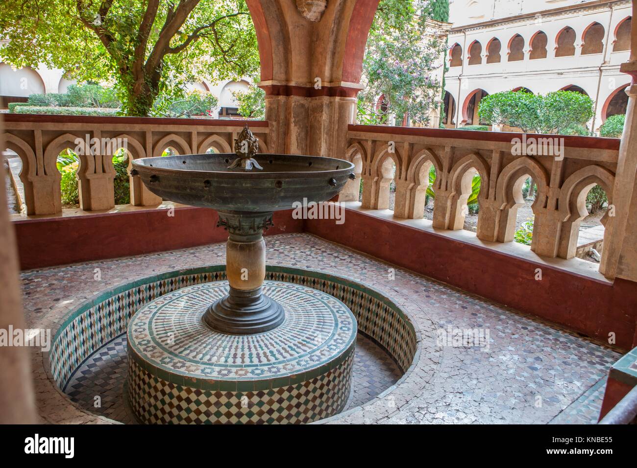 Baptismal font at Mudejar cloister of Guadalupe Monastery. Caceres, Extremadura, Spain. Stock Photo