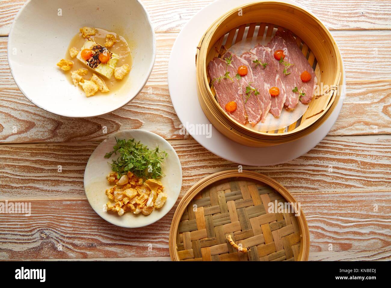 Iberian pork ham with XO sauce and cabbage stew with pork rinds Stock