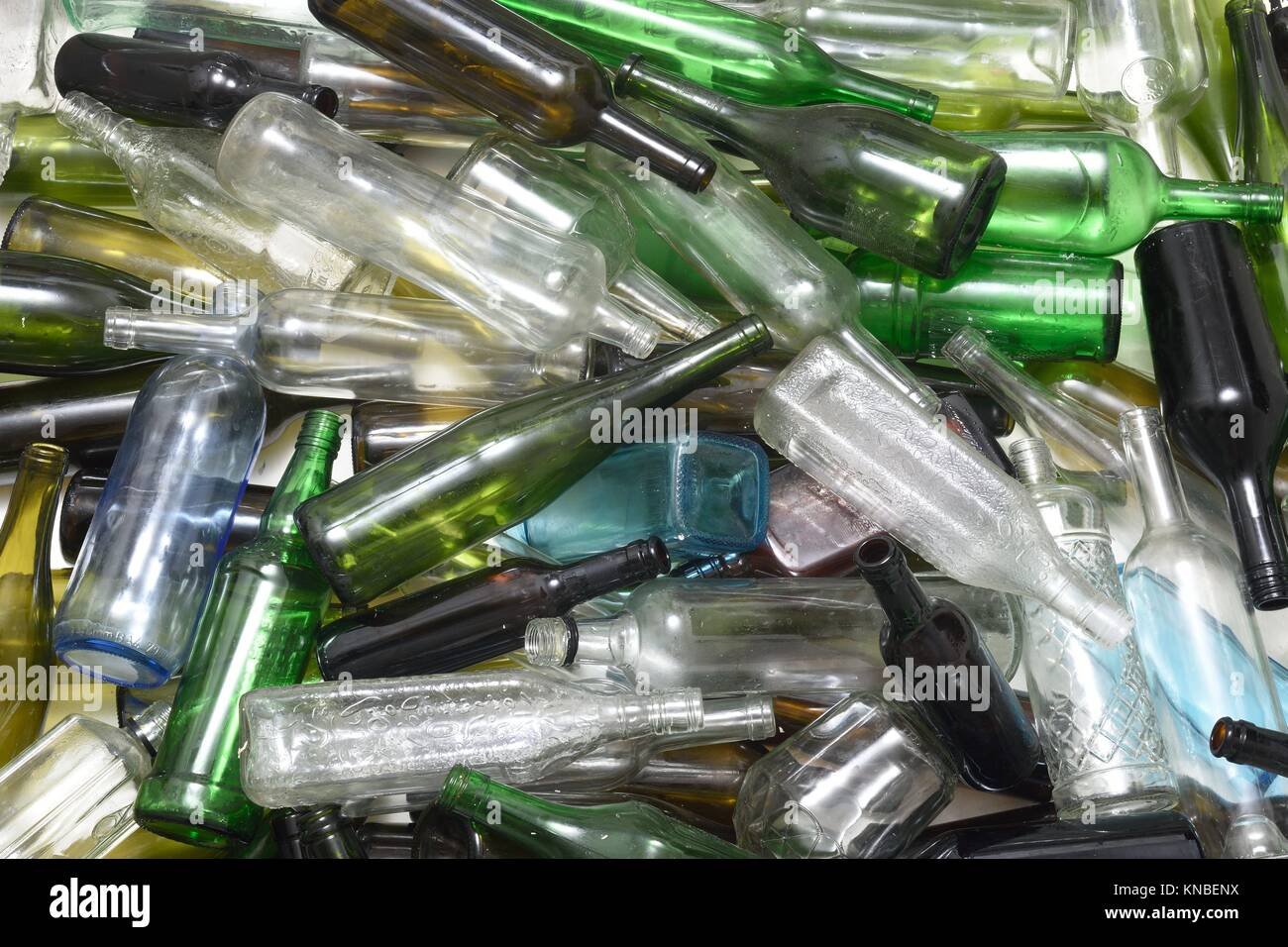 Glass bottles inside a glass recycling container Stock Photo Alamy