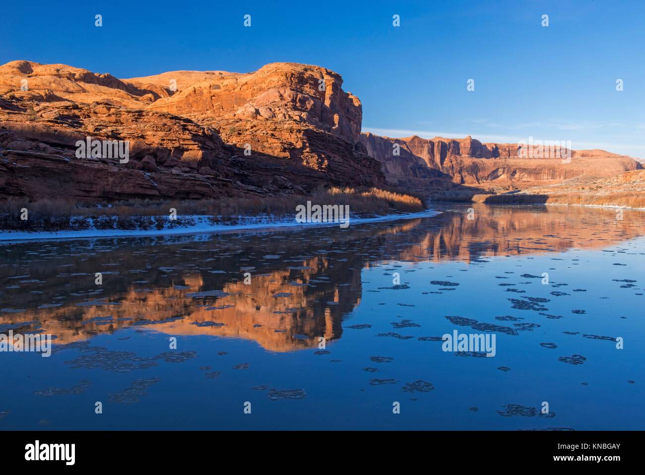 Winter reflections in the Colorado River, Arches National Park, Utah, USA. Stock Photo