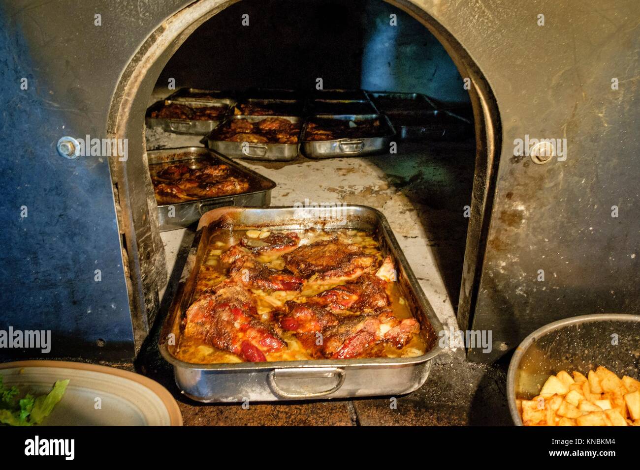Lamb and goatkid in traditional oven, restaurante Es Verger, puig de