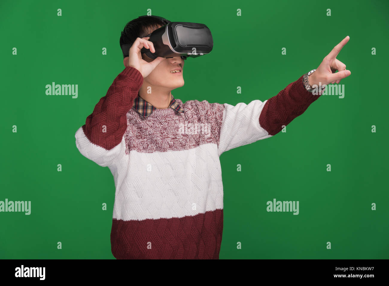 Man wearing virtual reality headset Stock Photo - Alamy
