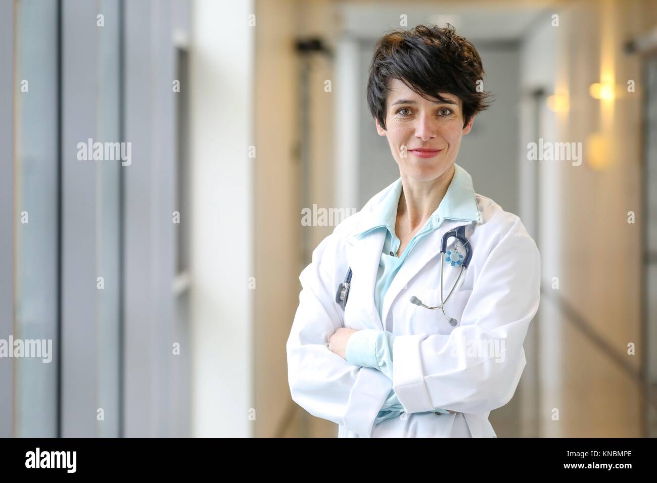 Doctor in corridor, Hospital Stock Photo