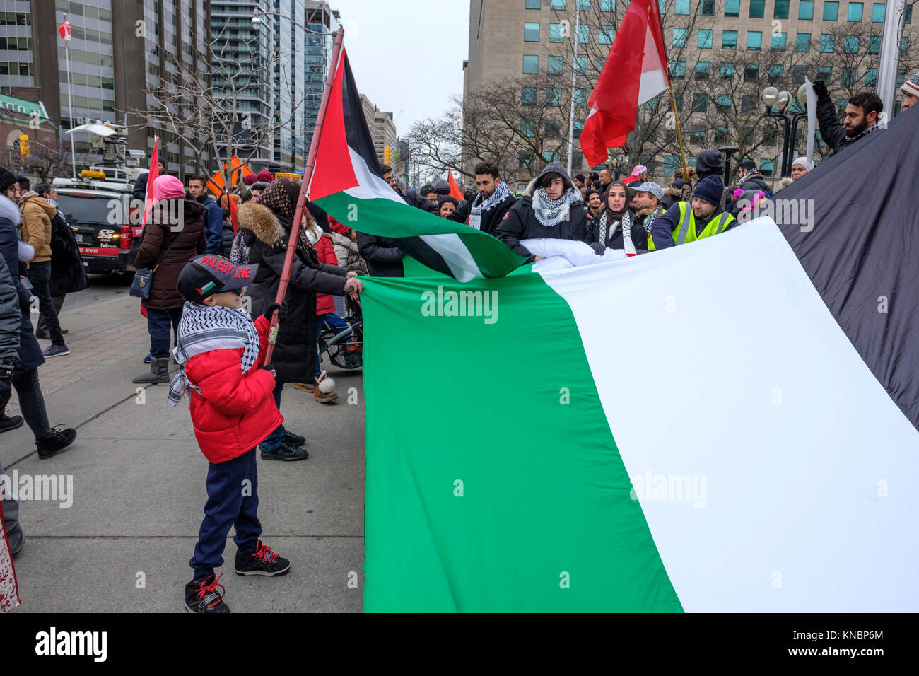 Palestinian protesters gathered in Toronto, Canada, protesting against president Donald Trump decision recognizing Jerusalem as Israel's capital. Stock Photo