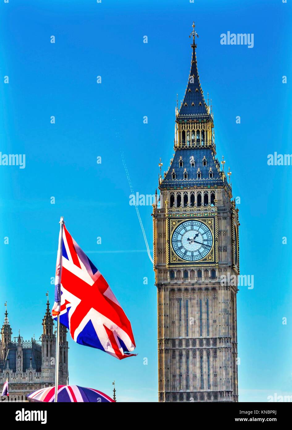 Big Ben Tower British Flag Houses of Parliament Westminster London England.  Named after the Bell in the Tower. Has kept exact time since 1859 Stock  Photo - Alamy