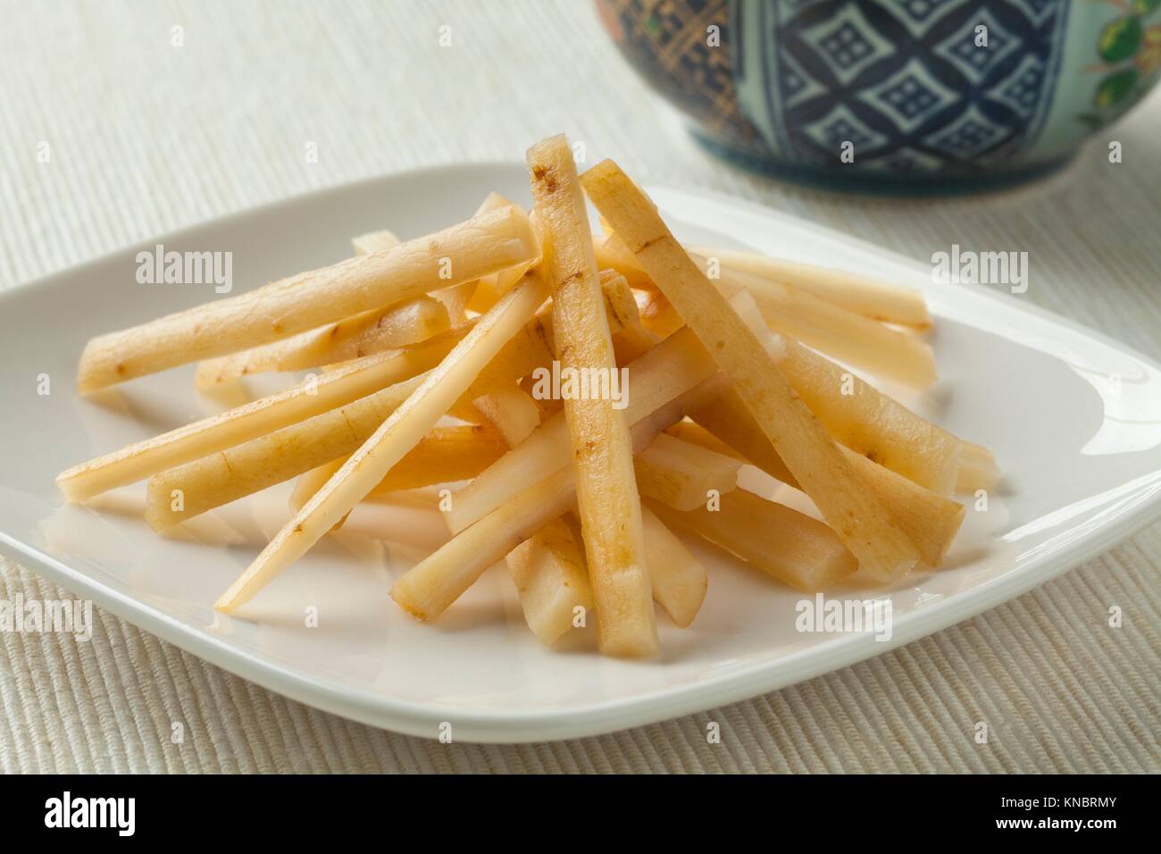 Dish with Japanese pickled burdock roots called gobo Stock Photo Alamy