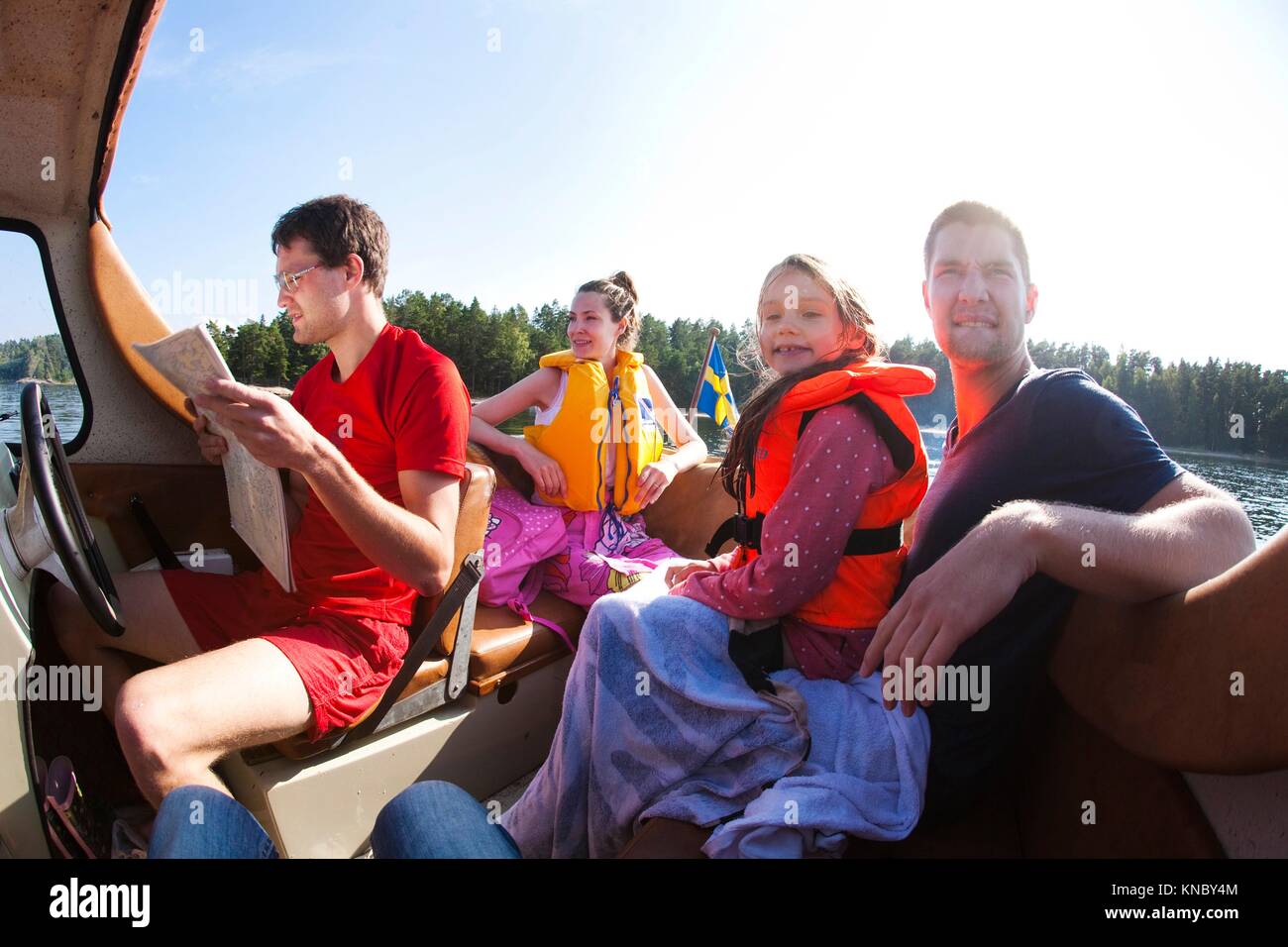 Family boat trip, Swedish archipelago. Stock Photo